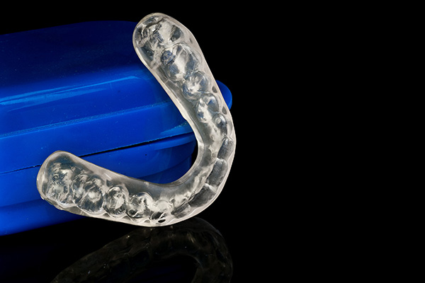 How Night Guards Prevent Excess Wear on Teeth from Heather Feray Bohan, DDS, PA in Tomball, TX